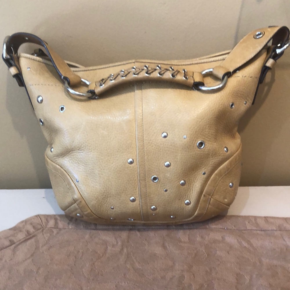 Coach tan studded leather bucket bag